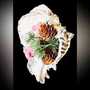 Artisan crafted seashell with greenery, berries & pine cones